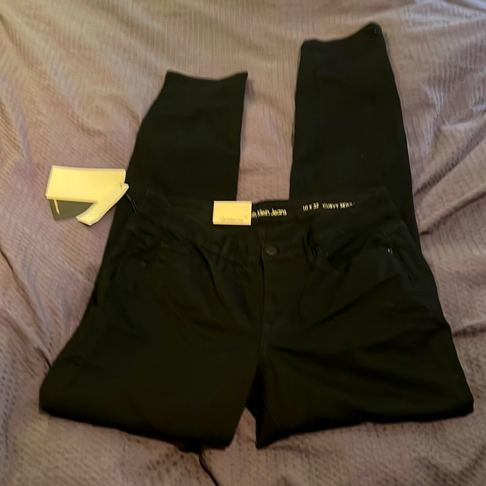 Calvin Klein black curves skinny size 10 x 32 chino jeans NWT